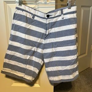 Tommy Hilfiger shorts. 8”length. Blue and white stripe.